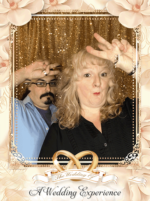 Two people taking a photo.