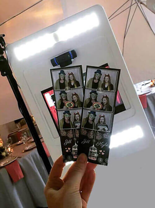 Showing off their pictures at our Classic Photo Booth.